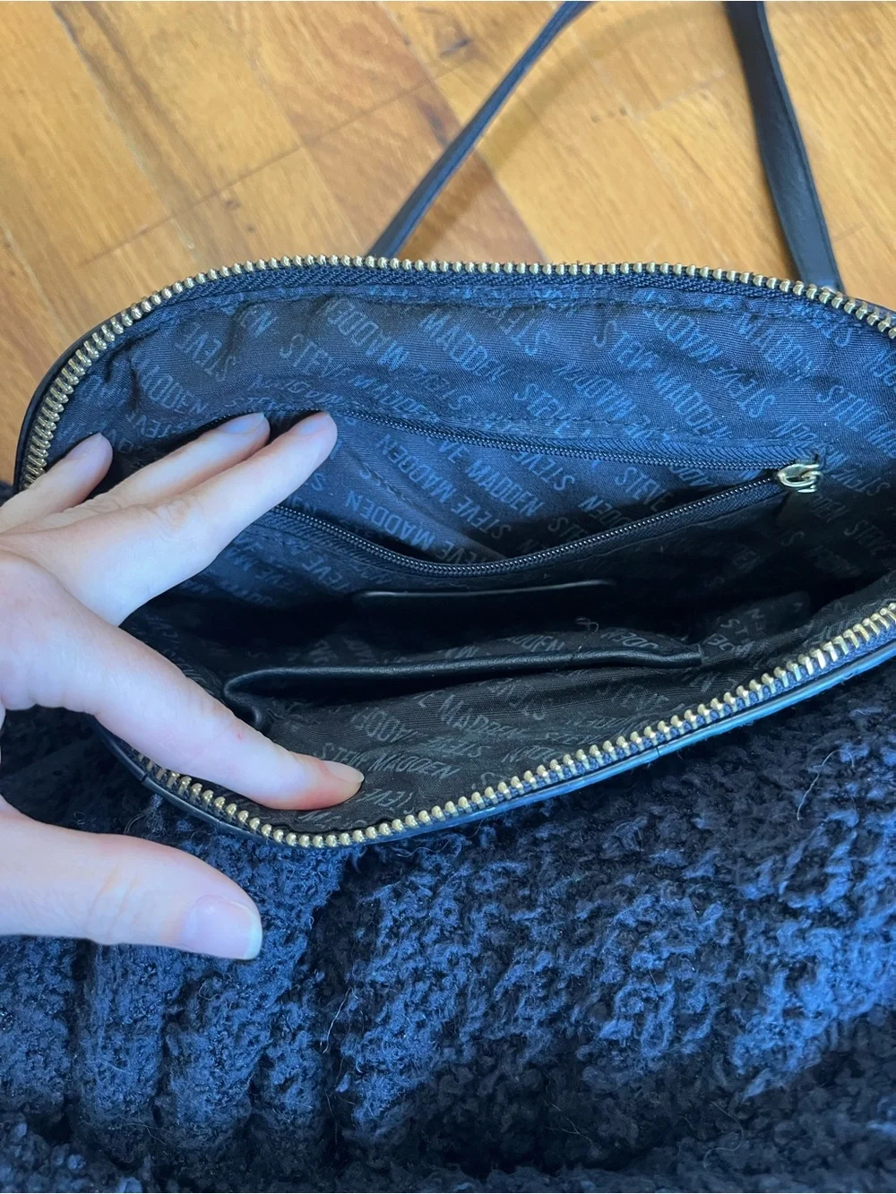 Steve Madden Black Embossed Logo Wristlet Clutch